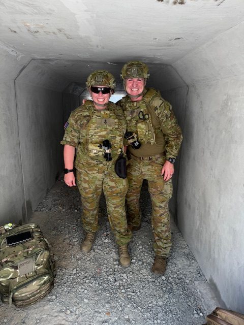 Dr Justin Hunter with a Defence colleague